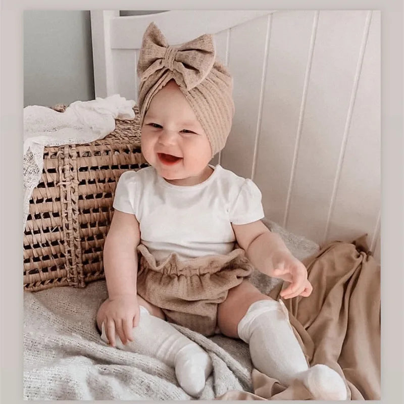 Snuggle in Style: Adorable Knitted Baby Hat with Bowknot