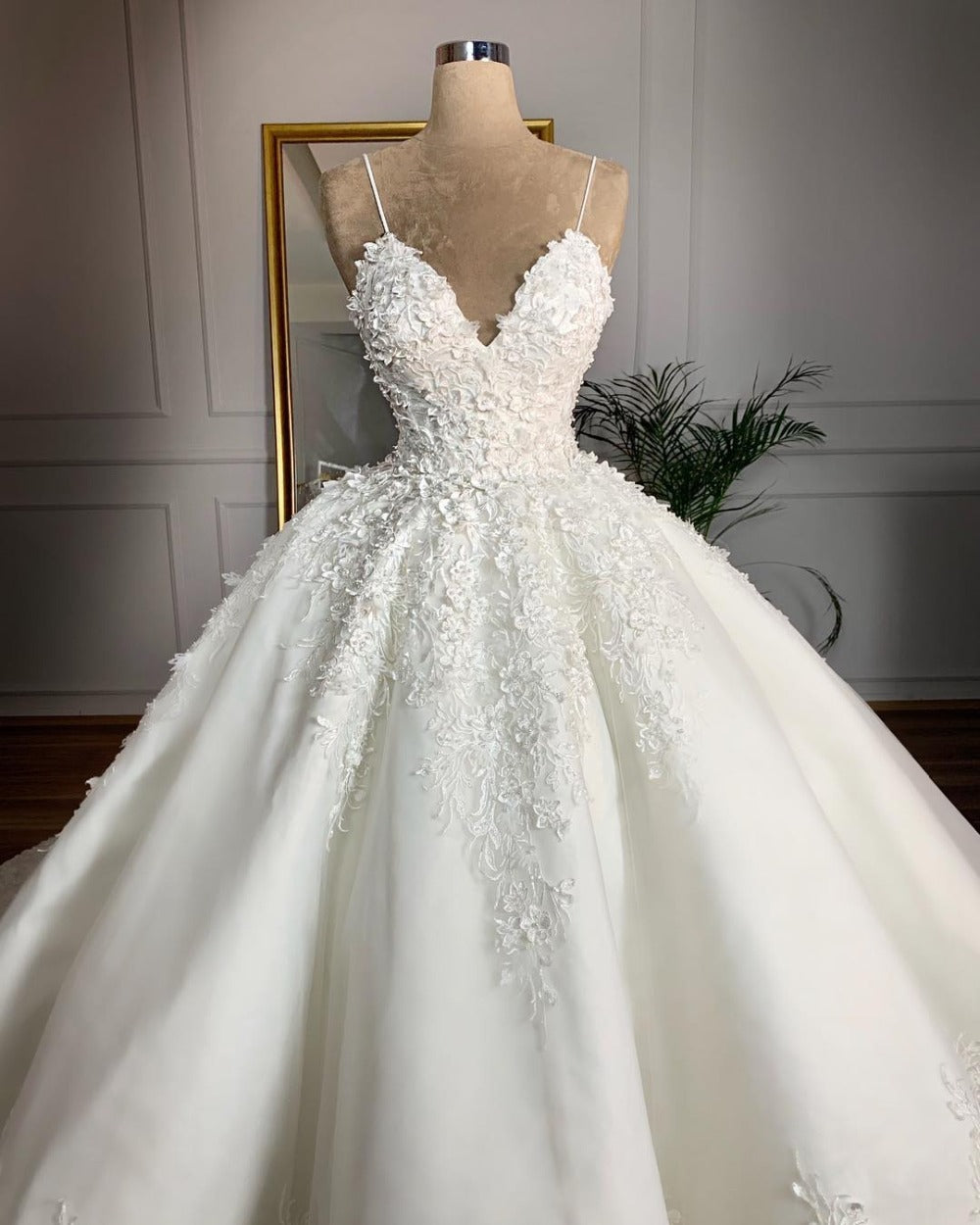 Romantic Radiance:  Deep V-Neck Lace Wedding Dress for 2024 Brides