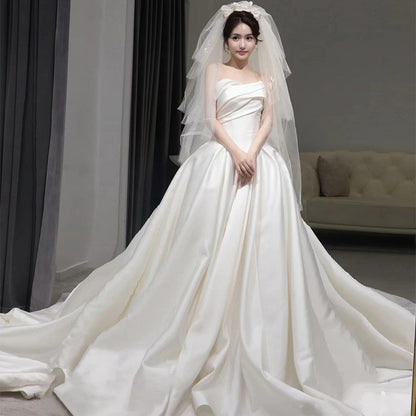 Feel Like Royalty:  Satin Wedding Dress with Elegant Train