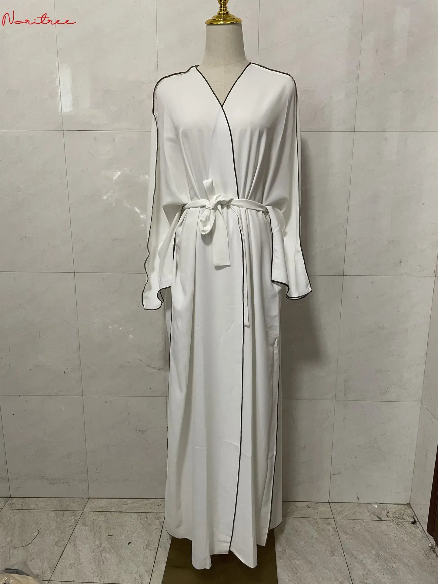 Embrace Elegance with Our Oversized Belted Abaya